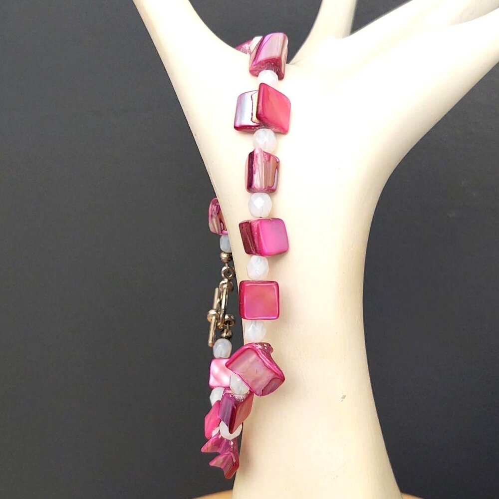 Polished dyed pink shell and white beaded bracelet